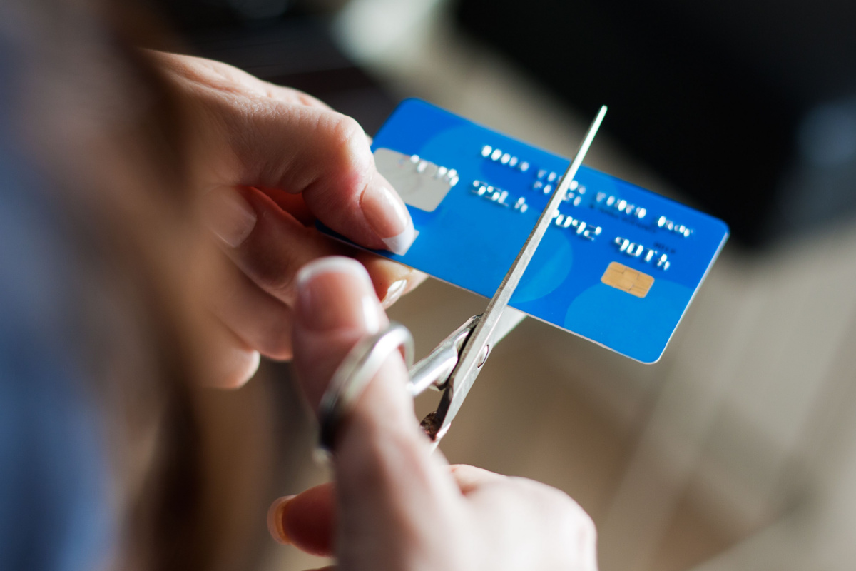 Cardholder cutting credit card