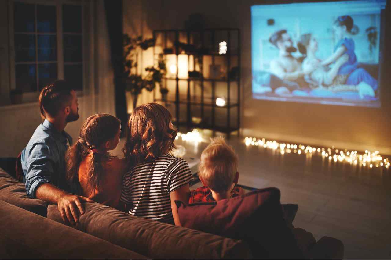 Family having movie night at home