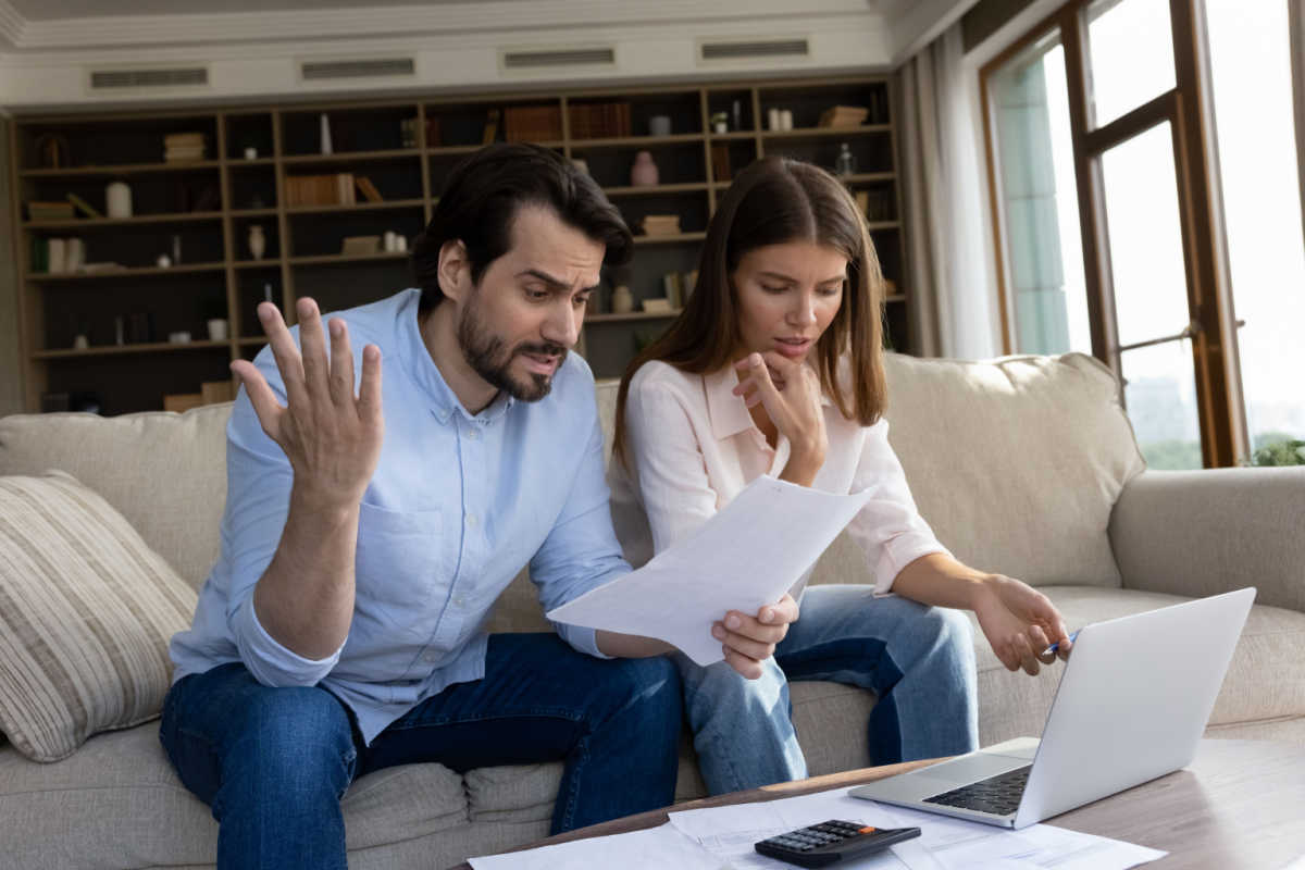 Young couple stressed over bills