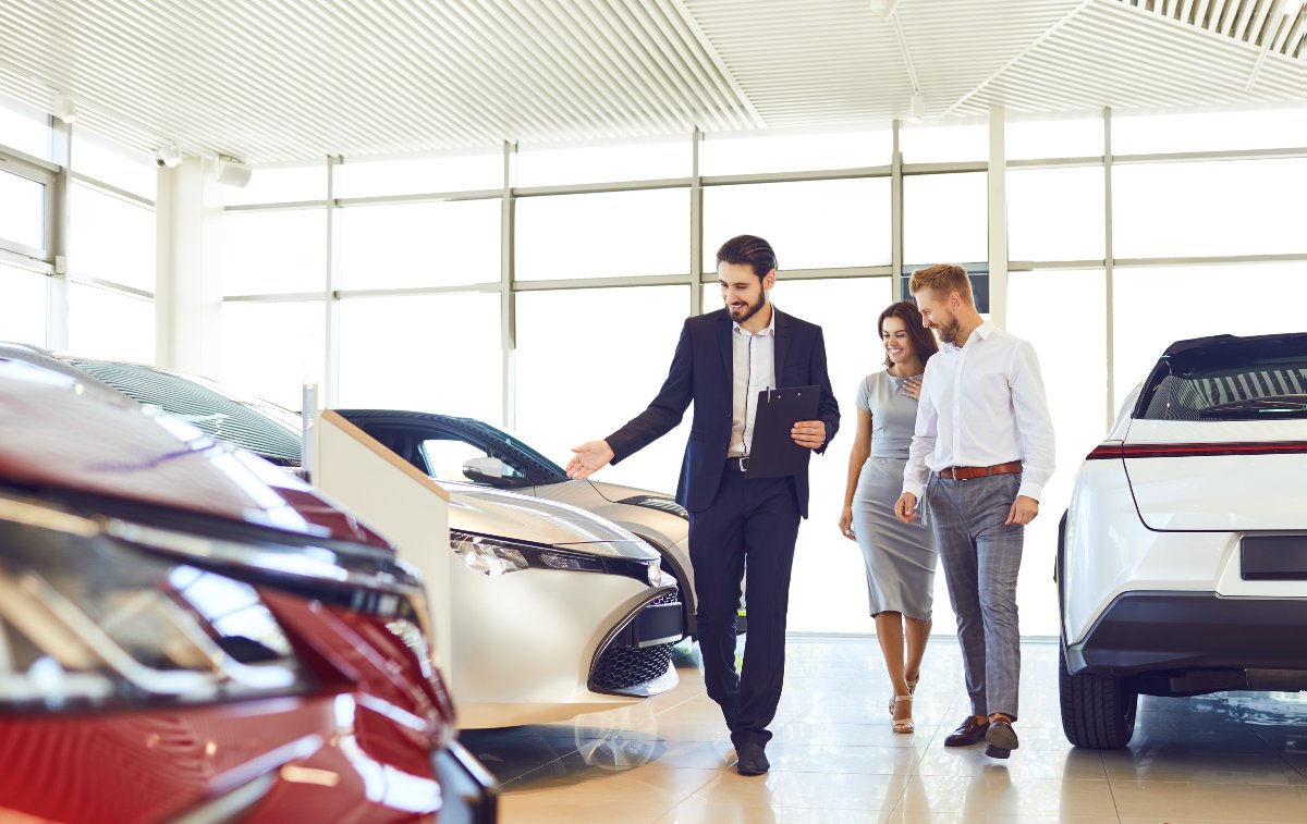 Car salesperson showing cars 
