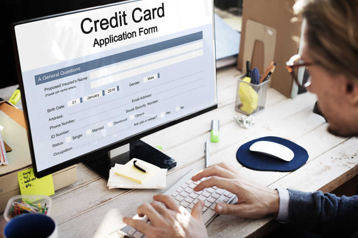 Individual signing up for credit card online