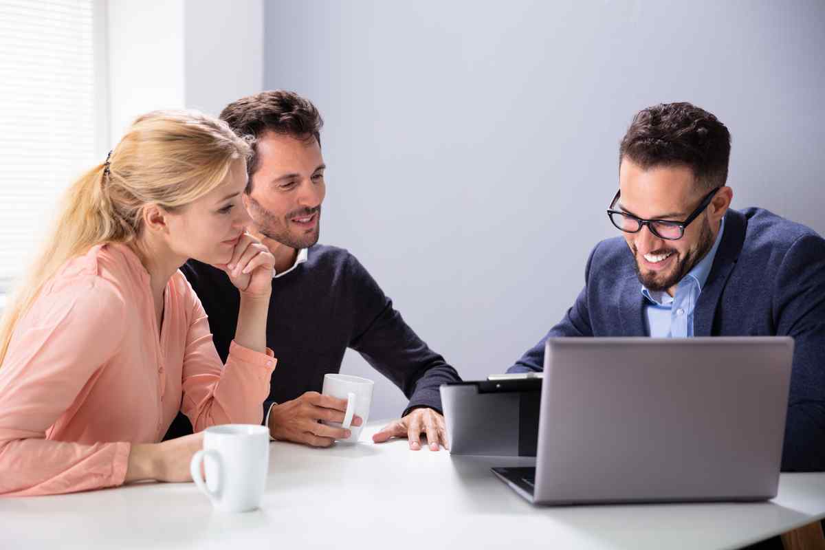 Couple meeting with a credit counselor. 