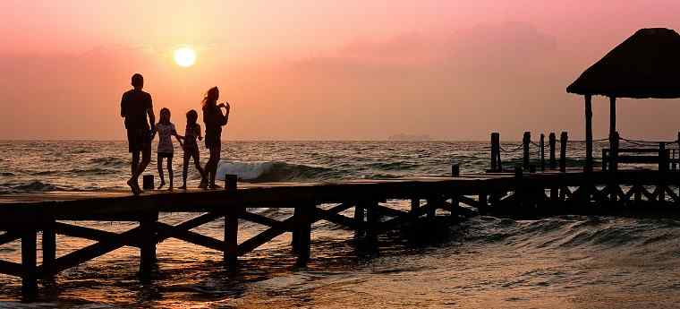 Family on beach vacation getaway.