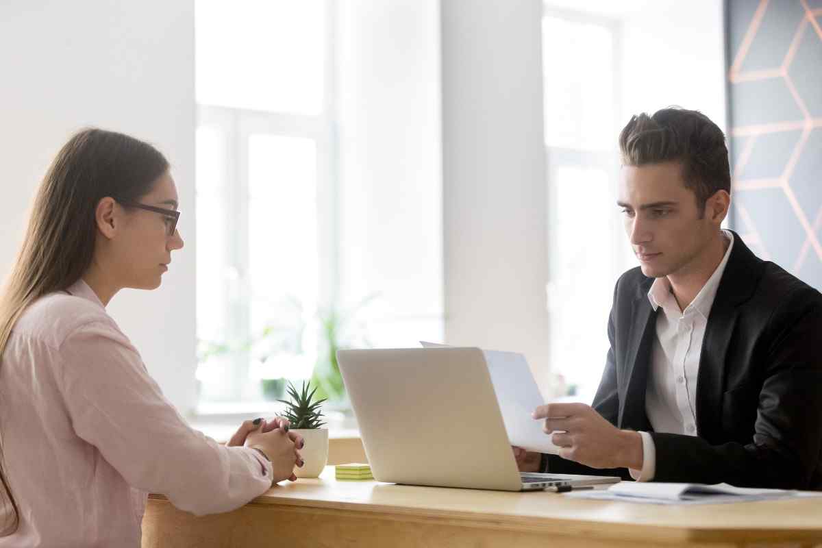 Young adult meeting with finance professional.