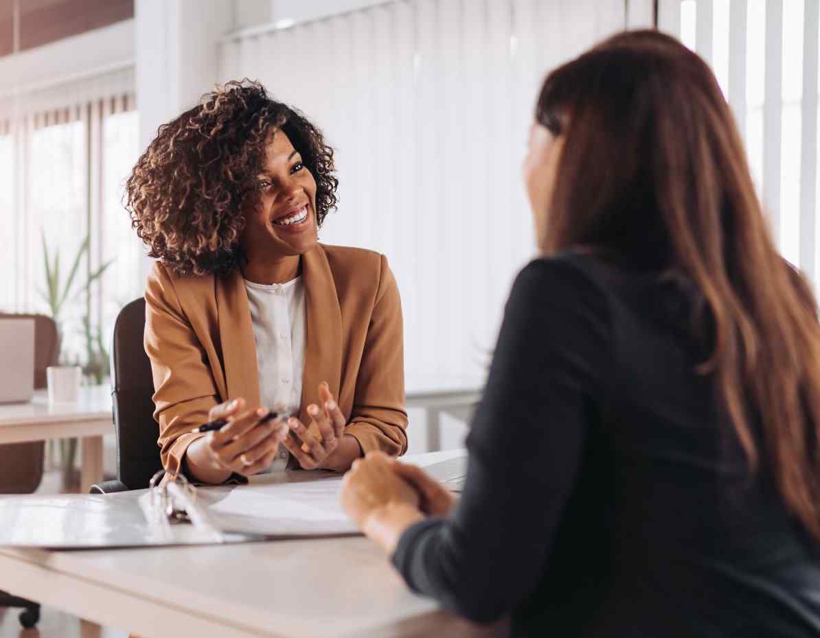 Borrower meeting with financial banker.