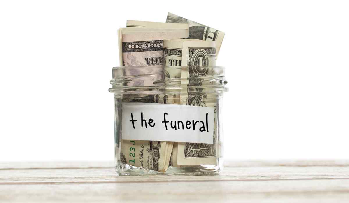Jar with money saved up to go toward a funeral.