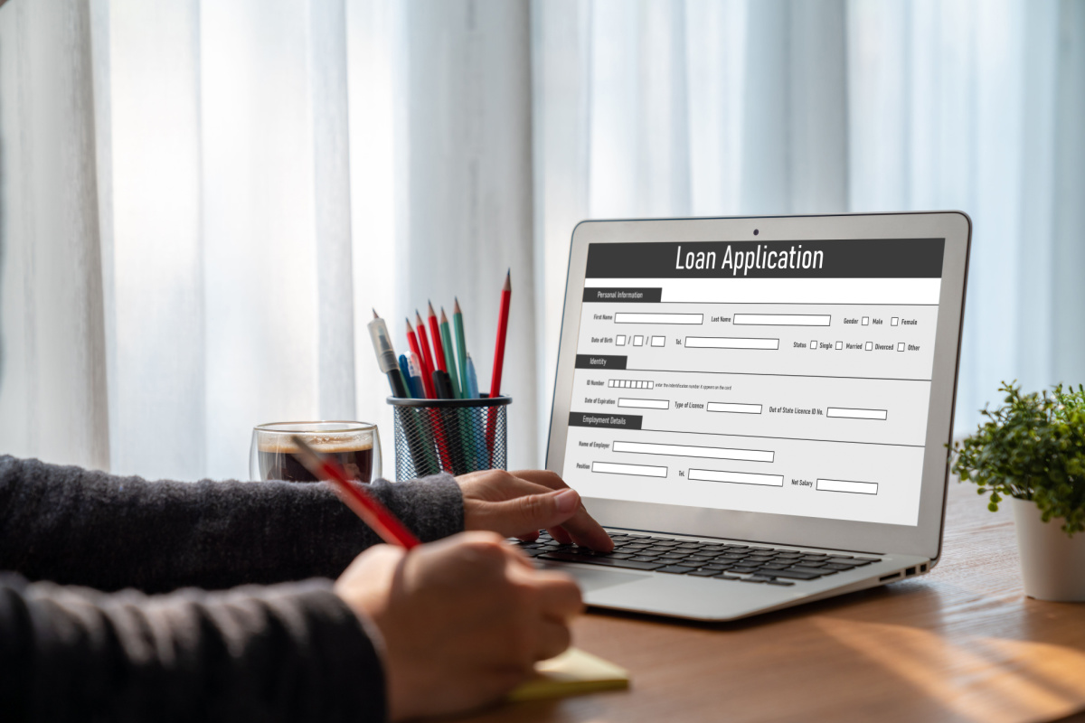 Individual completing online loan application