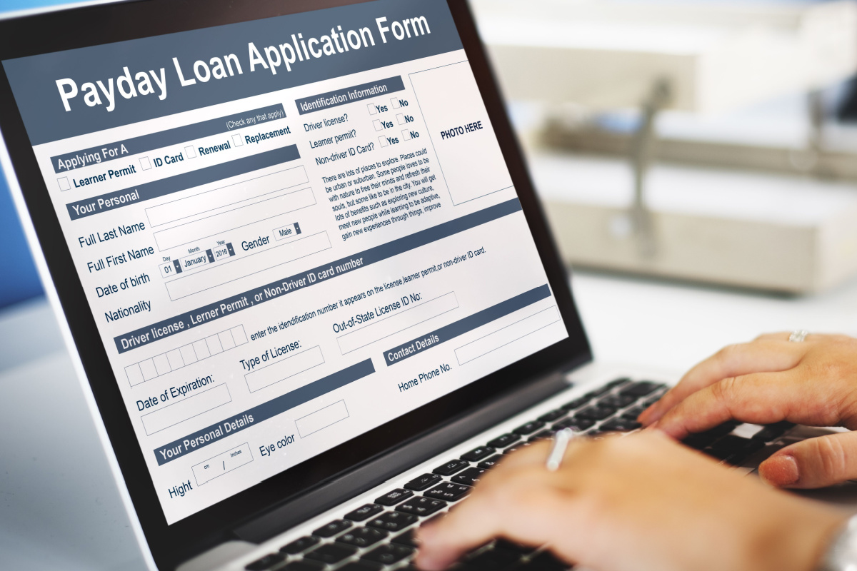 Individual applying for a payday loan online