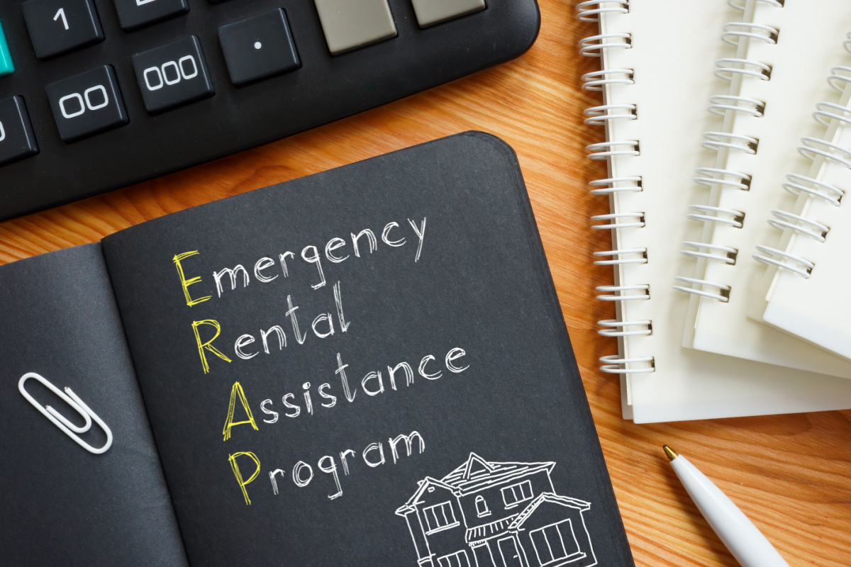 "Emergency Rental Assistance Program" written in notebook