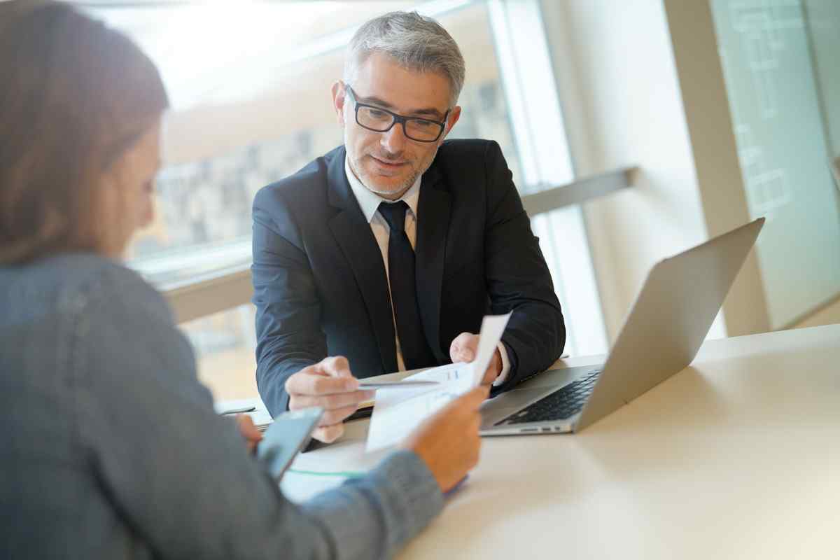 Business associates reviewing document.