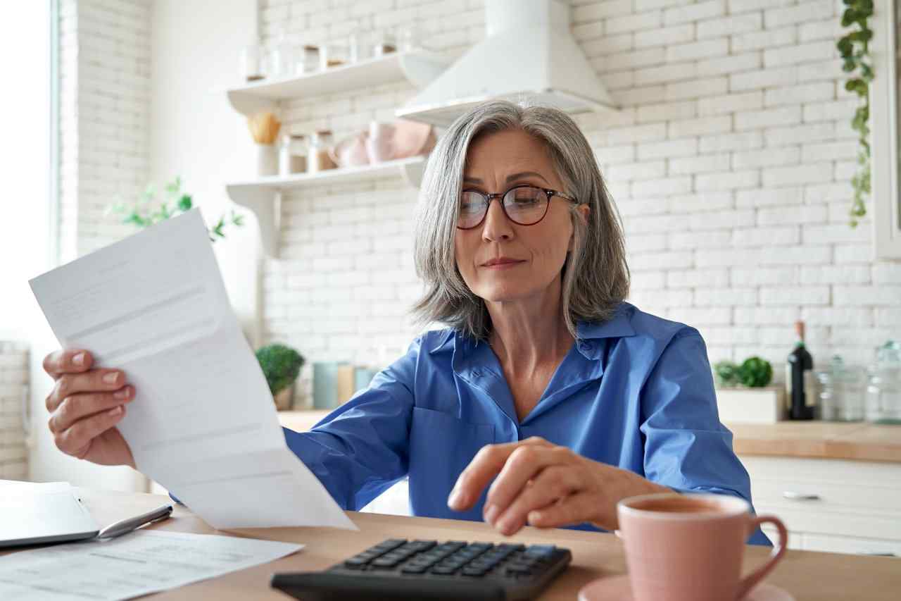 Retiree calculating taxes.