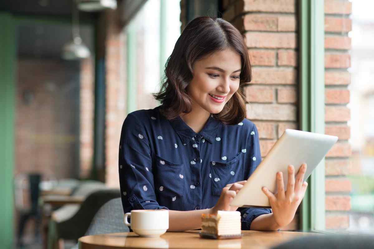 Young adult using tablet.