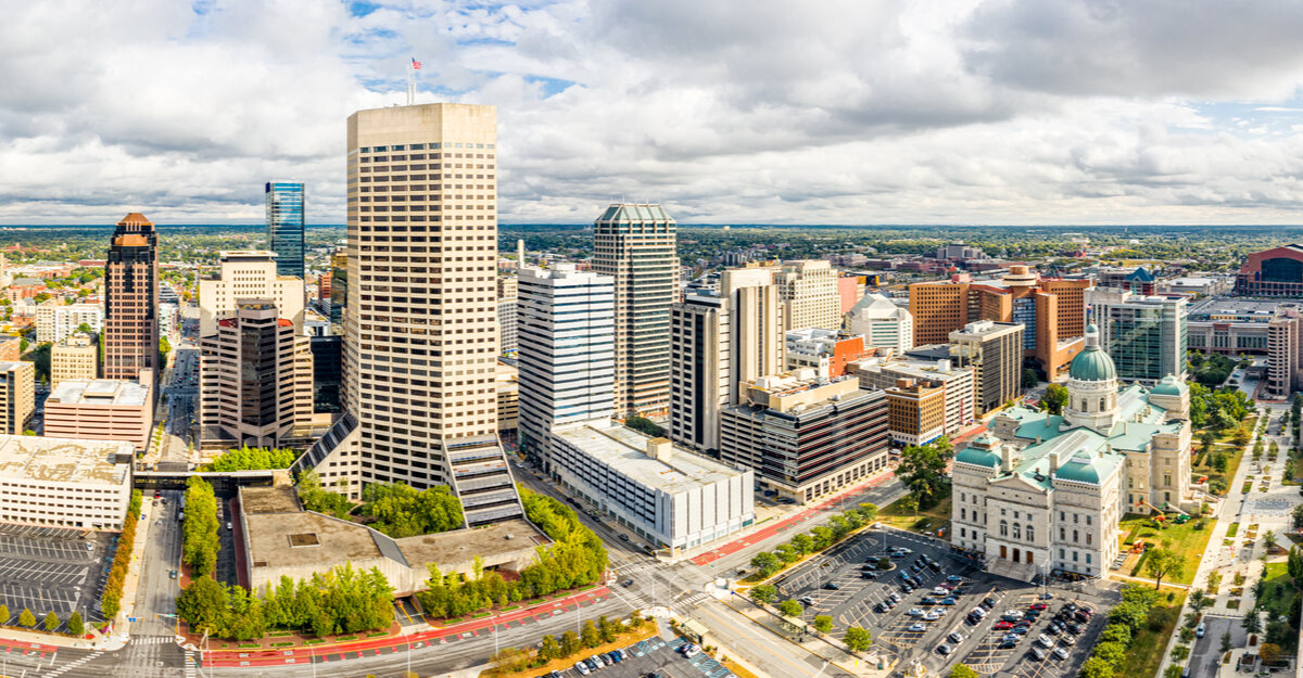 Landscape view of Indiana Statehouse and downtown buildings.