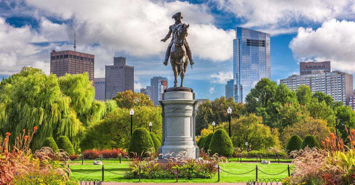 View of historical monument in front of buildings in downtown Boston, Massachusetts.