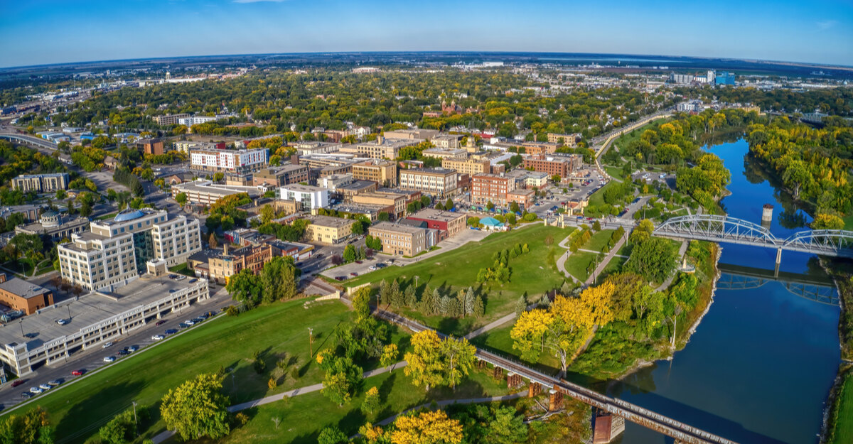 Overhead view of lake, bridge, and buildings in North Dakota.