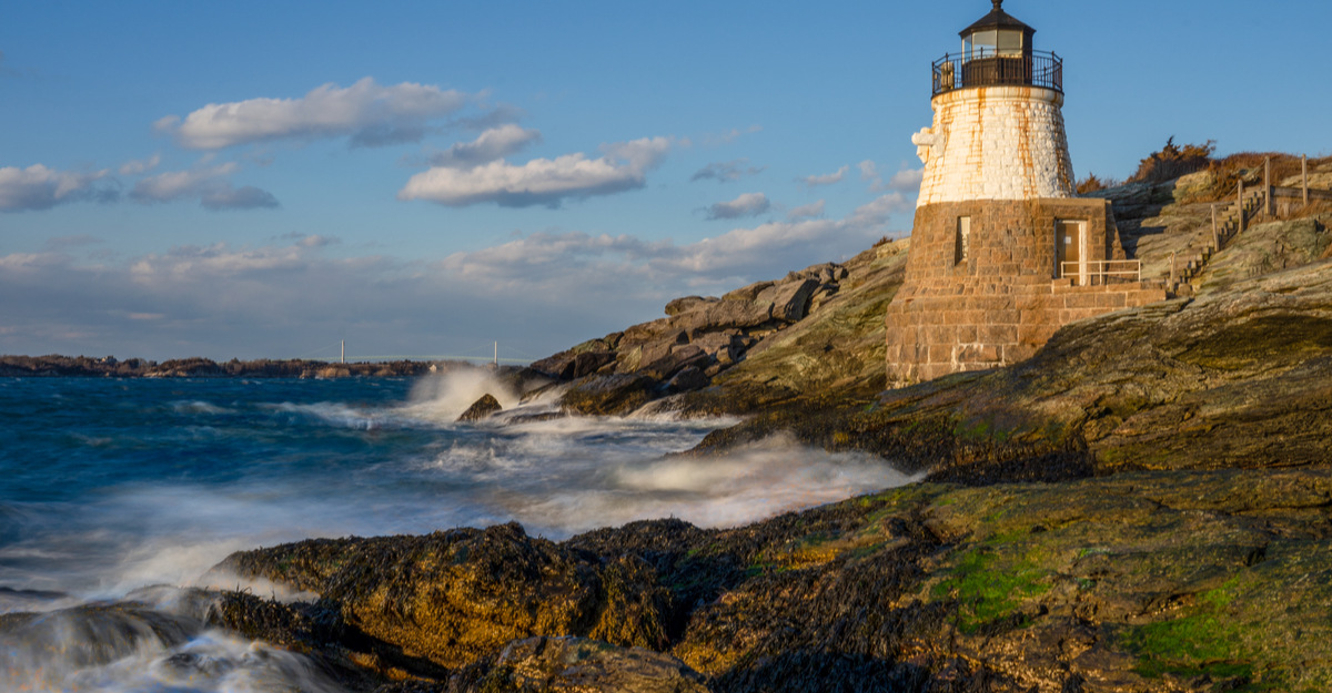 Closeup on lighthouse and coast in Rhode Island.