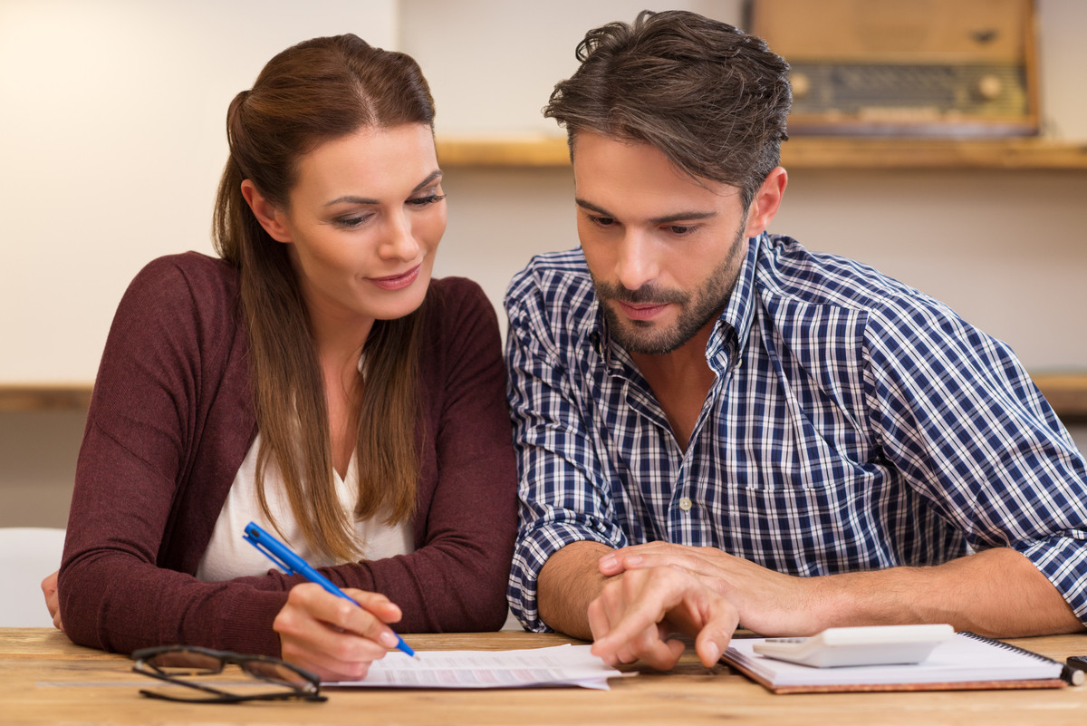 Couple working on their finances.